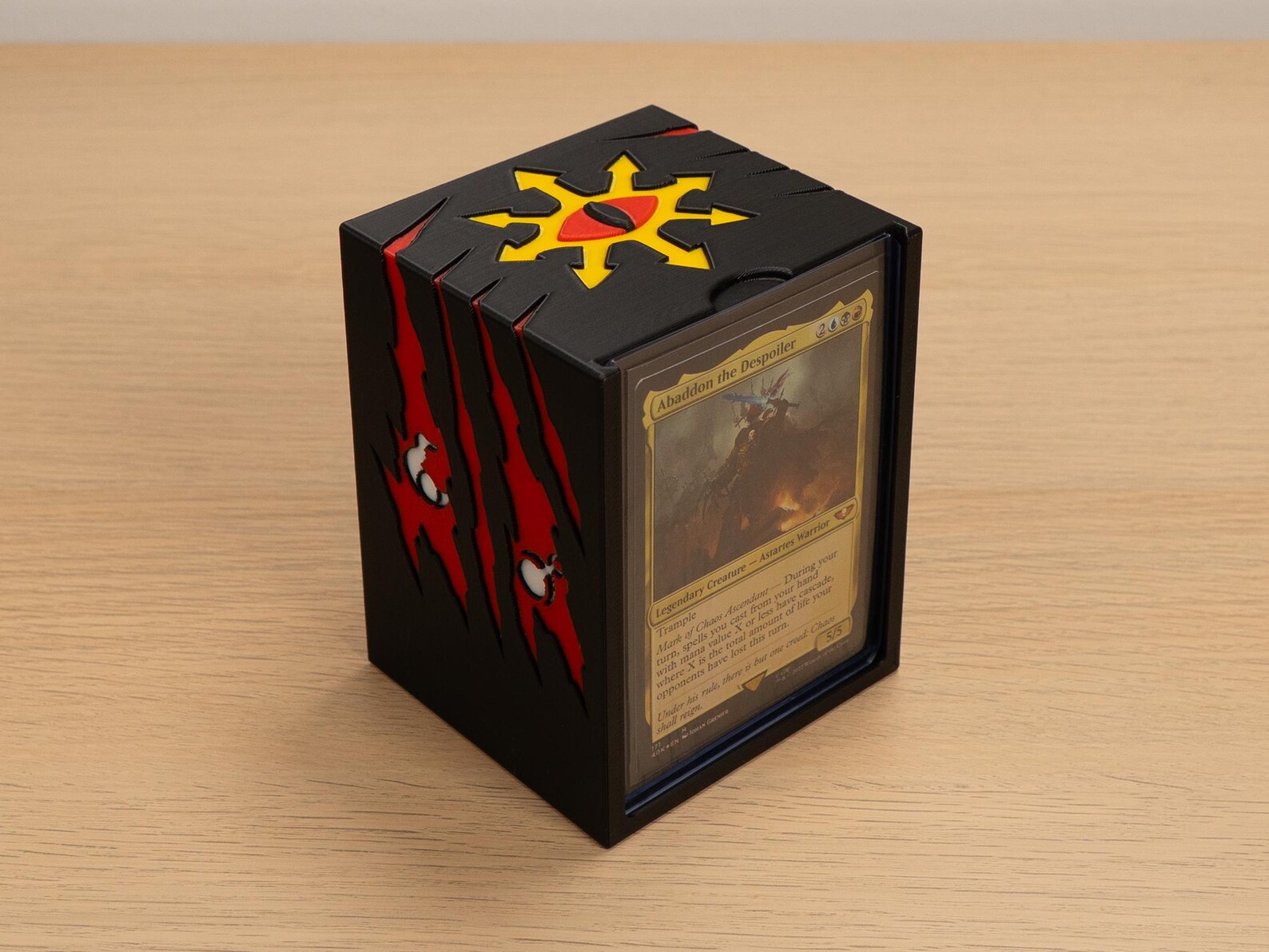 Chaos deck box with red claw marks and a yellow Chaos star