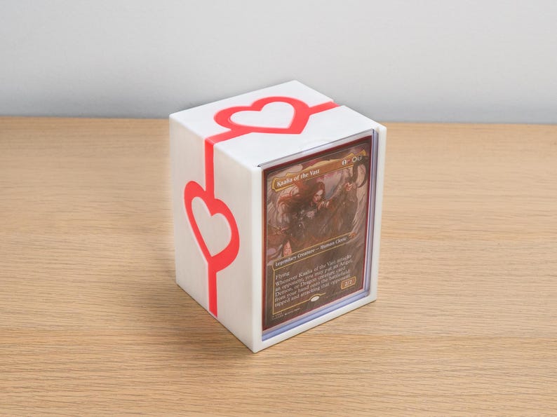 White deck box with red heart detailing