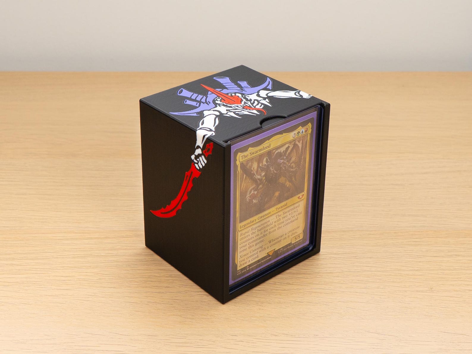Black Tyranid deck box with a white and purple design